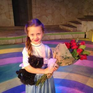 Calli as Dorothy in Wizard of Oz at Center Stage