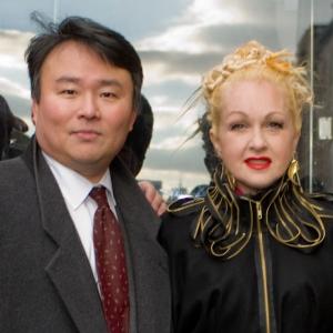 David W Chien poses with Ride of Fame Honoree Cyndi Lauper January 27th 2011