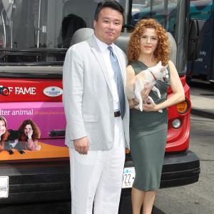 David W Chien poses with Ride of Fame Honoree Bernadette Peters August 21st 2012