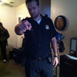 Matt Thornton Police Officer 1 in costume on set of Sudden Reality.