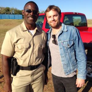 Lead vocalist for the Kings of Leon (Caleb Followill) and Actor Bruce Davis (III) on the set of the video Beautiful War