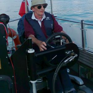 At the helm of a Motorboat Cowes Isle of White