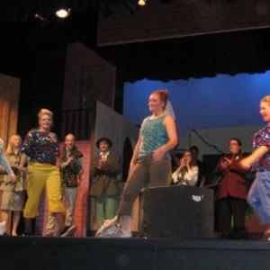 On stage during The Little Shop of Horrors.