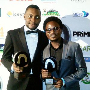 After my win at the 2014 Nollywood Movies Awards red carpet with my lead actor, Tope Tedela.