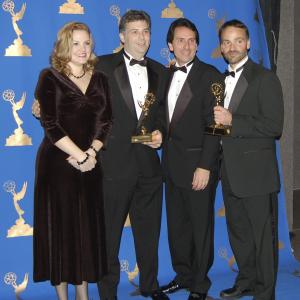 Kristin Klinger Scott Silberstein Matt Hoffman and John Ford picking up Emmy Awards in 2005