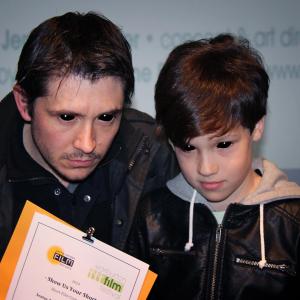 Director Matthew Holmes and Bailey in scary mode collecting an award for The Artifice at Warburton film festival