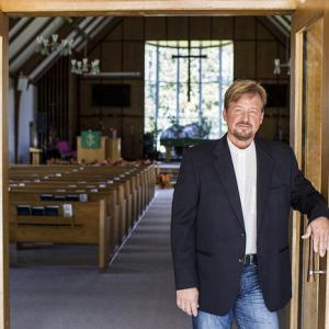 The Rev. Frank Schaefer in his sanctuary at Zion United Methodist Church of Iona in Lebanon county. He could lose his ordination credentials after he performed his son's same-sex wedding.