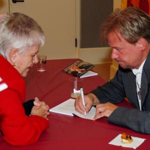 Rev Frank Schaefer signs copies of his book Defrocked at the Metropolitan United Methodist Church in Washington DC