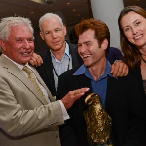 Tom Berenger presenter of The Chris Brinker Award to John Beaton Hill for Most Outstanding First Feature Film for The Wolves of Savin Hill with producer Sean Ireland and actress Suzanne Willard