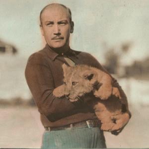 George E Lee with Leo the Lion baby cub at the MGM Studio Zoo in Culver City