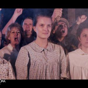 Amber Dawn Fox is far right second row during the Witch Execution in The Hollow Oak