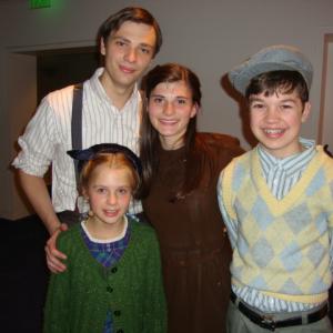 The four Pevensie children Grayson Yockey Andrea Fantauzzi Brett Rawlings and Journey Tupper in Narnia The Musical at the Kauffman Center produced by Starlight Childrens Theatre