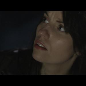 Faith Bruner as Officer Julie Stokes in Dormant