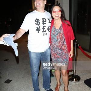 Mark Cuban and Joyce Chow arrive for the Premiere Of The Asylums Sharknado 3 Oh Hell No! held at iPic Theaters on July 22 2015 in Los Angeles California