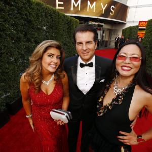 Elizabeth Webster, Vincent De Paul and Joyce Chow arriving at the Primetime Emmys at the Microsoft Theatre in Los Angeles, CA on September 20, 2015