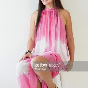Joyce Chow wearing Mayasutra poses for portrait at The Starving Artists Project hosted by Mayasutra Clothing on February 17 2015 in Los Angeles California