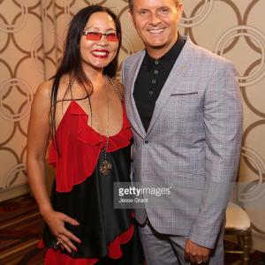 Producer Joyce Chow and producer Mark Burnett attend The Salvation Army Sally Awards at the JW Marriot at LA Live on October 1 2015 in Los Angeles California