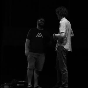 Writers Johnathan Paul and David Goodman discuss scenes during production of The Great Hanging