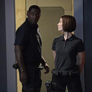 Still of David Harewood and Chyler Leigh in Supergirl 2015