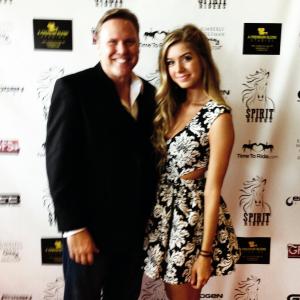 Carlton Caudle on the red Carpet with actress Allie DeBerry at the premiere ofSpirit Riders