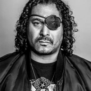 A Black & White still in character as a biker that was part of Ray Katchatorian's photography show 'Captured' which exhibited at the Arclight Hollywood.
