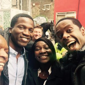 David Olawale Ayinde with Adrian Lester and some other actors on set of the BBC1 TV Drama UNDER COVER