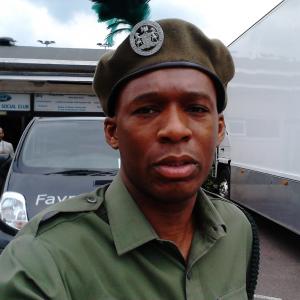 David Olawale Ayinde as a Soldier on set of the film LEGEND Starring Tom Hardy