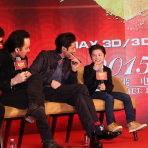 Jackie Chan, John Cusack & Adrien Brody listen to Jozef Waite tell a story about filming Dragon Blade at the premiere in Beijing. February 2015.