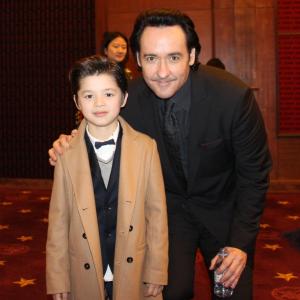 John Cusack with Jozef Waite in Beijing China for the Dragon Blade premiere