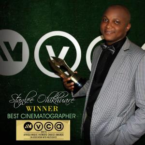 Stanlee Ohikhuare holding his Award for BEST CINEMATOGRAPHER at the 2015 Africa Magic Viewers Choice Awards AMVCA