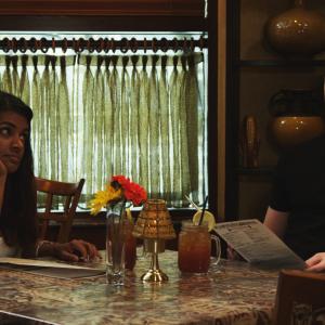 From left to right: Sharanya Ravi (Sunita), James Poole (Paddy) in the scene of their first date.