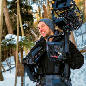Director of Photography Russ De Jong operating a Steadicam shot in the winter snow.