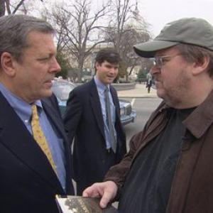 Michael Moore talking with Congressman John Tanner (D-TN) on Capitol Hill. He spent the day there approaching pro-war members of Congress to recruit their children to fight in Iraq.