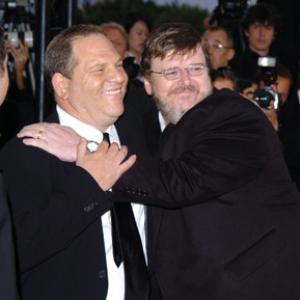 Harvey Weinstein and Michael Moore at event of De-Lovely (2004)