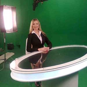 Chroma key green screen Elizabeth Jeanne le Roux as a news anchor
