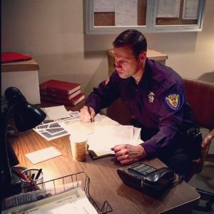 Ben Kacsandi as Officer Bobby Dunes in Murder Book