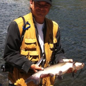 Joe Martinez with a nice catfish on the Kern River in California.