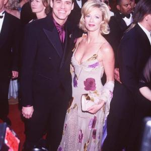 Jim Carrey and Lauren Holly at event of The 69th Annual Academy Awards (1997)