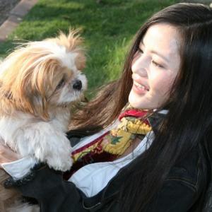 actress Nina Xining Zuo with her shihTzu puppy