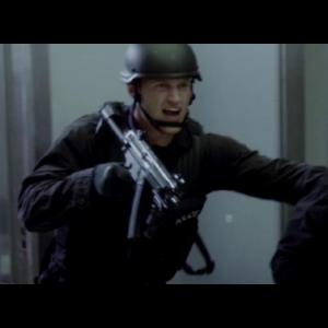 Jeremy Ninaber as swat shooting the music video memories