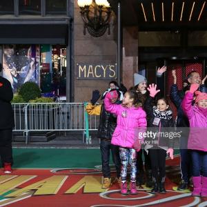 RAINA CHENG (Far right) at the 89th Macy's Thanksgiving Day Parade Rehearsal with Sesame Street cast members Alan Muraoka & Suki Lopez; Questlove & fellow child performers, 11/2015. She performed on the Sesame Street Float in the previous year a