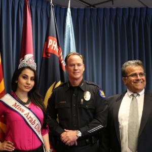Director George Nemeh with 2014 Beauty Pageant winner and the honor of Phoenix PD commissioner