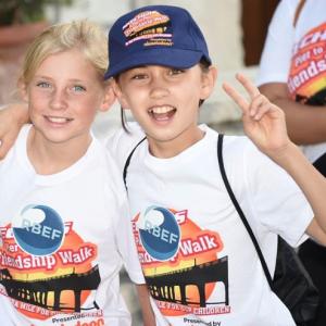 Theresa Laib & BFF Eden at Skechers 2014 Pier-to-Pier Friendship Walk to raise funds for Special Needs Kids. At https://www.facebook.com/SKECHERSFriendshipWalk