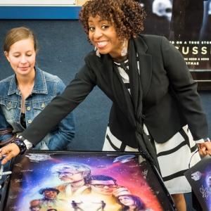 12215  STAR TREK WARS Premiere  poster signing Role Mellody Hobson George Lucas wife