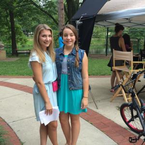 Maddie Busch with sister Haley Busch filming Marshall the Miracle Dog