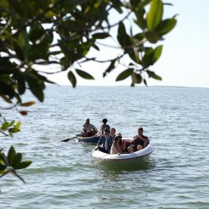 Cast and crew returning to shore from shooting out at sea And I On the Opposite Shore Key Largo FL