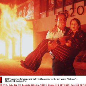 Still of Tommy Lee Jones and Gaby Hoffmann in Volcano 1997