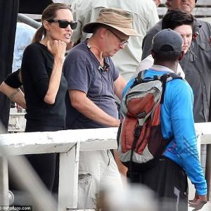 Angelina Jolie Joe Reidy and me discussing plans for the high school track  field running scenes of the movie Unbroken