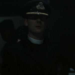 Still of Anthony Maddalena as the Ship Chaplain in Britannic