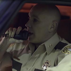 Mark Dossett as Sheriff Parks in THE TORMENT OF LAURIE ANN CULLOM